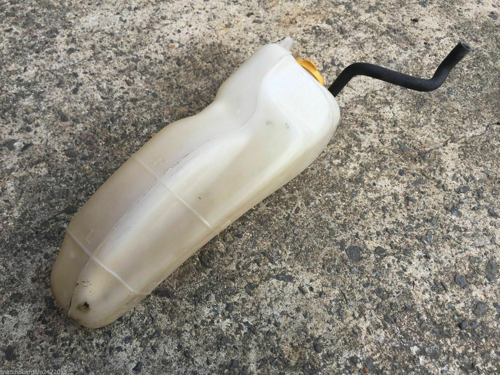 Subaru coolant reservoir overflowing deals